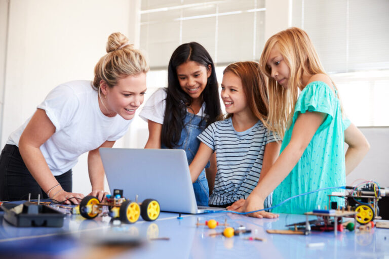 three female students with teacher building robot 2023 11 27 04 48 44 utc 1024x683 1 768x512