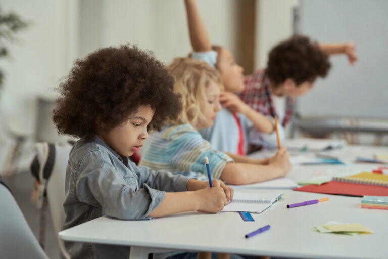 diligent little schoolboy writing in his notebook 2023 11 27 05 12 49 utc 1024x683 1 768x512