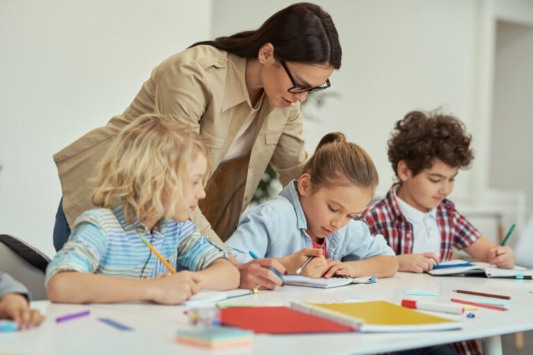 excellence kind young female teacher in glasses h 2023 11 27 05 01 19 utc 1024x683 1 768x512