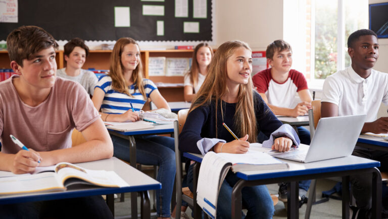 students listening to female teacher in classroom 2023 11 27 05 33 22 utc 768x435